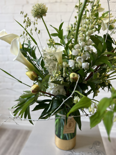 Seasonal Signature Vase - Locally sourced British blooms are our speciality and we expertly arrange in a vase so the recipient can simply sit back and enjoy. All our displays come complete with care informa