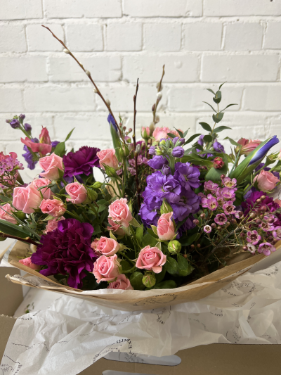 Seasonal Handtied Bouquet - A beautiful selection of seasonal flowers hand crafted into a handtied bouquet. 
Please note that colours and flowers may vary.
If you have any specific requests please let us know and although we cant guarantee, we will do our best to accomodate.
